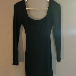 Black tight fit dress. Comfortable and stretchy material